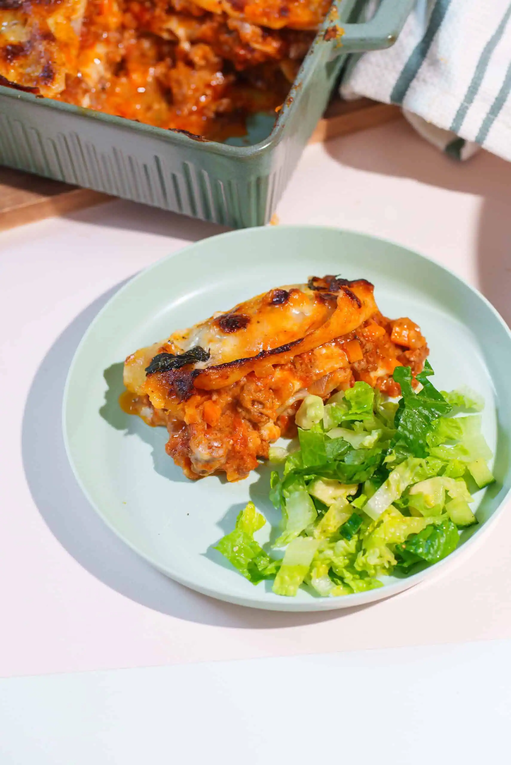 Child-friendly meal with lasagna and salad at Monkey Puzzle Feltham.