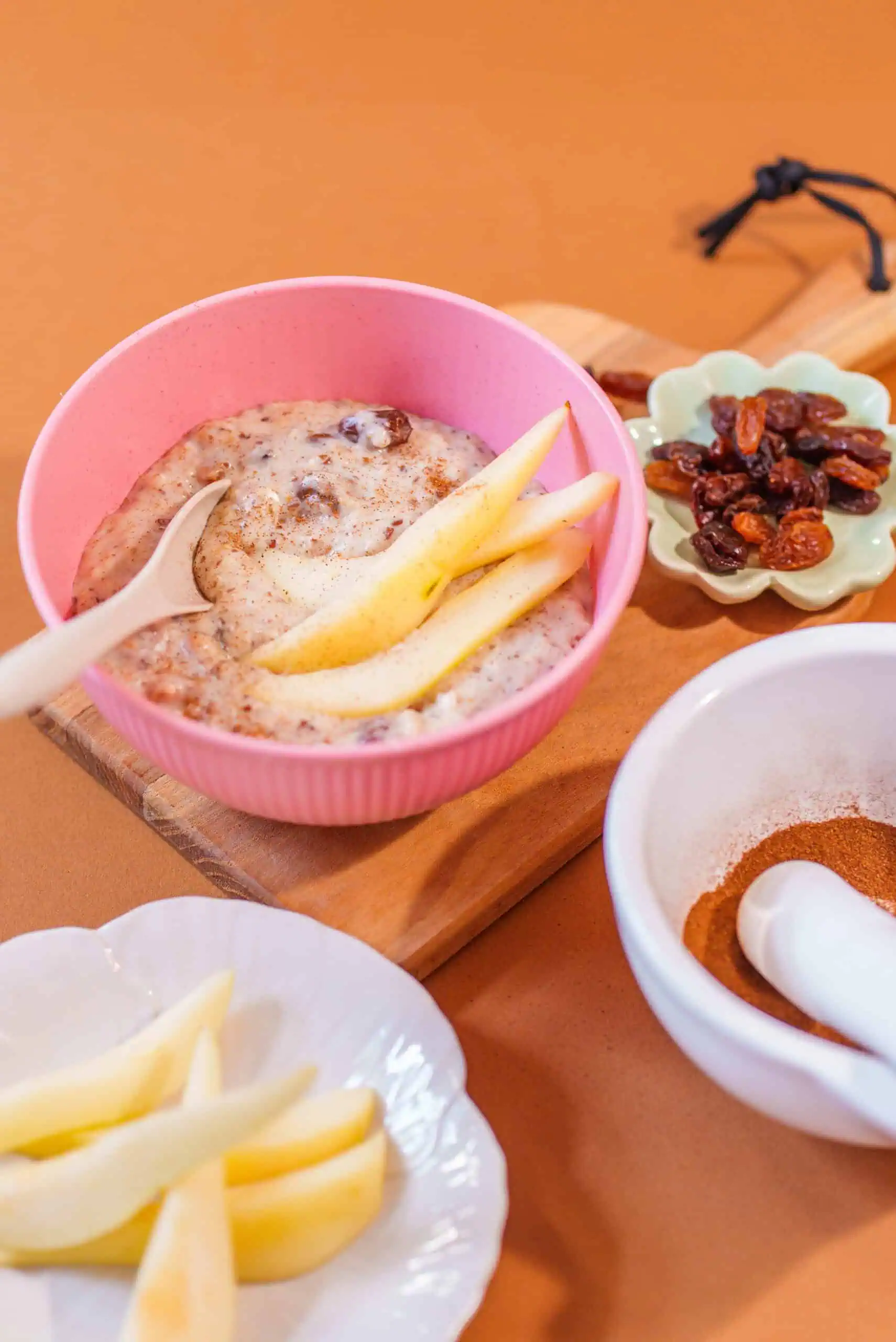 Kids breakfast with yogurt, fruit, and raisins at Monkey Puzzle Feltham.